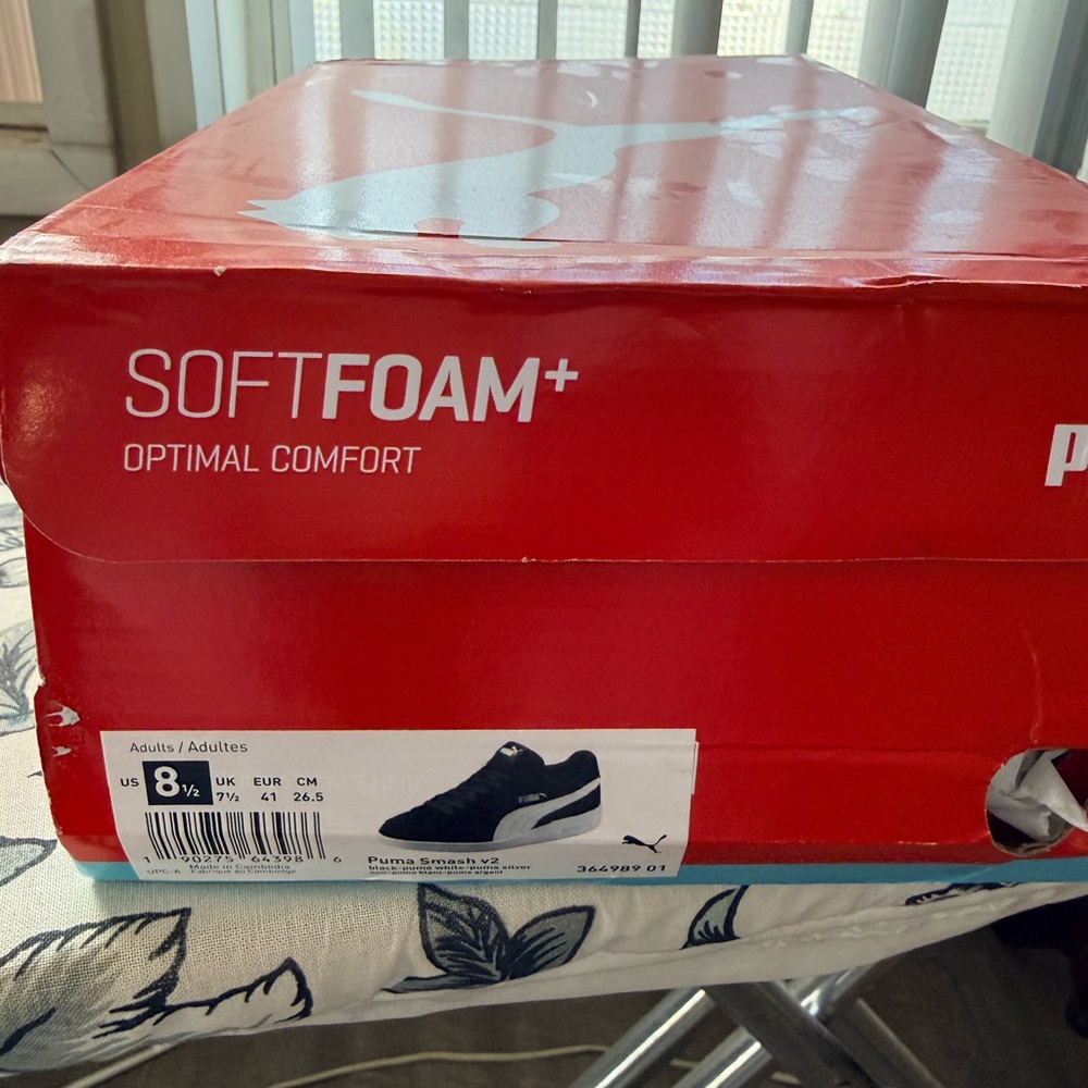 Women’s PUMA Black and White Sneakers